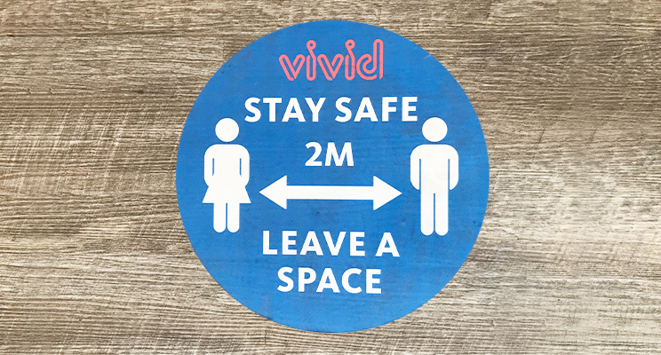 Vivid floor sign for COVID-19