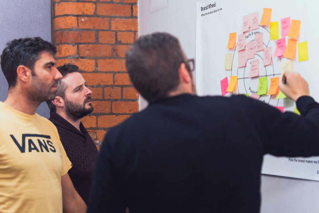 Jon Dickens, Ben Overton & Gerry Arcari discussing strategy in the Vivid meeting room
