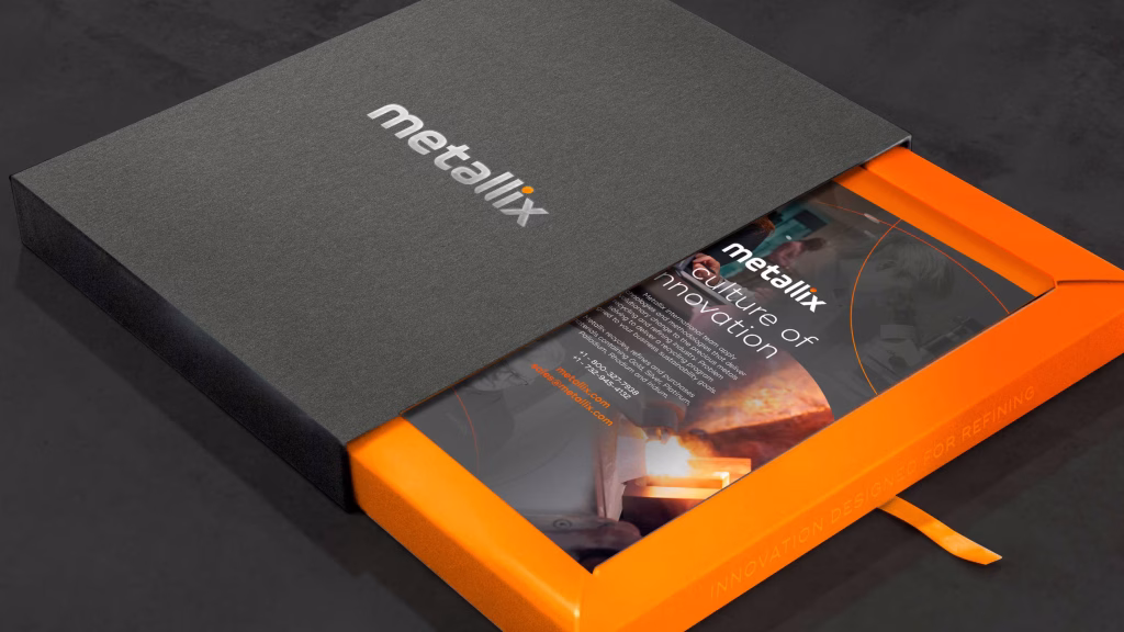 This image features a designed frame for Metallix – a precious metal refining company based in the US. The frame is decorated with the brand's signature charcoal grey and orange hue.